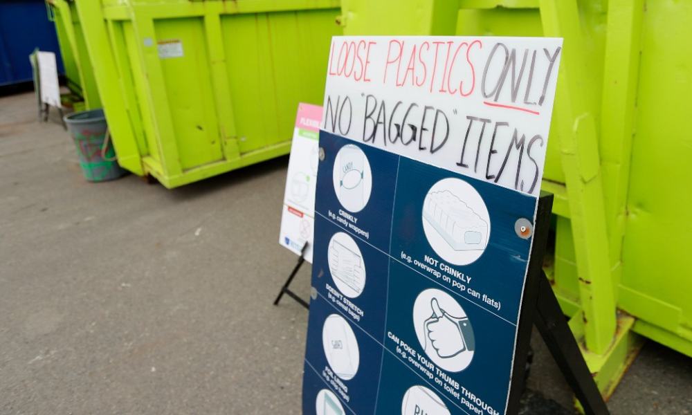 A sign at Oak Bay's drop off recycling depot saying "loose plastics only, no bagged items"